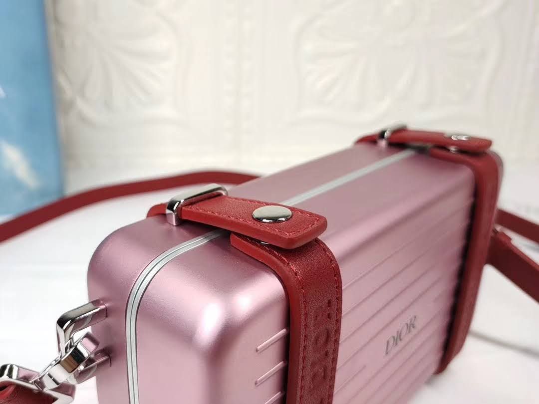 Presentation image of the pink Dior x Rimowa aluminum top