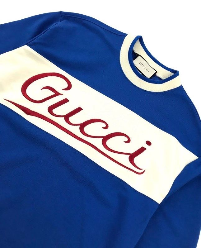 Blue Gucci Sweater logo detail presentation image