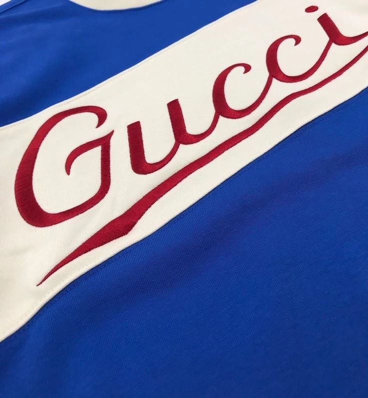 Blue Gucci Sweater logo detail presentation image