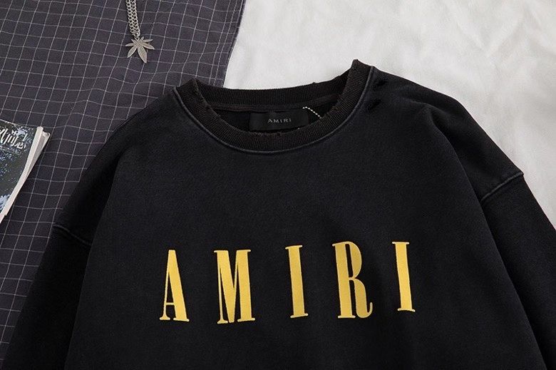 Black Amiri Sweater presentation logo image